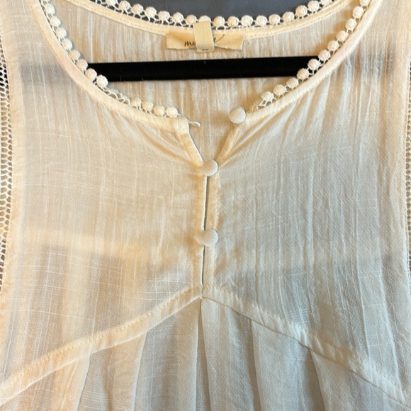 White tunic top with cute detail. Sheer and fits loose. - Picture 4 of 5